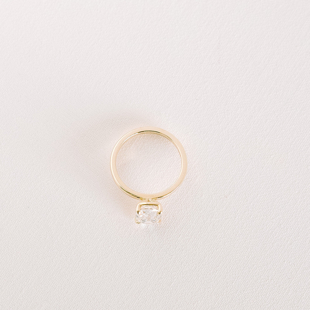 Top view of Heirloom ring in yellow gold with elongated cushion-cut lab diamond positioned downward.