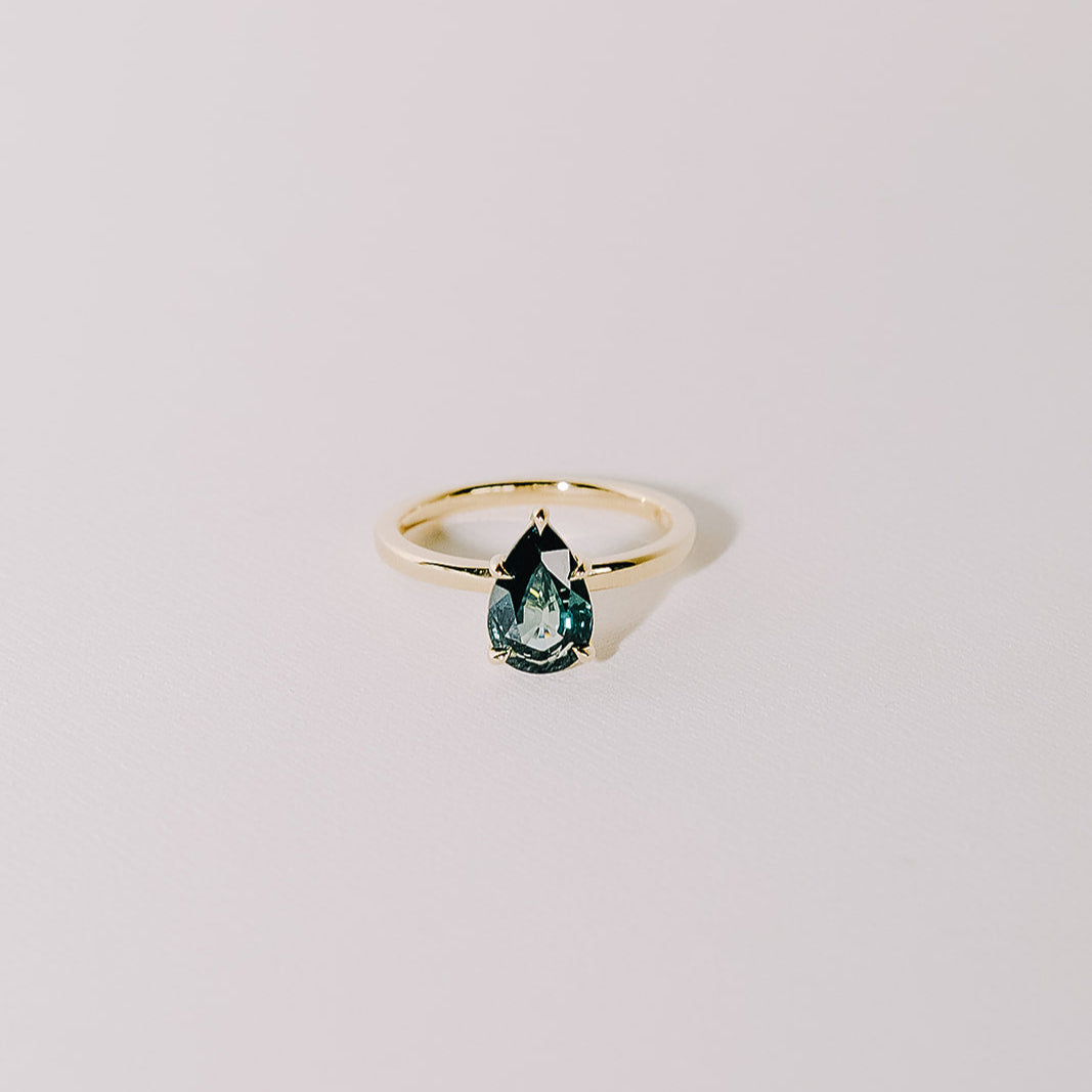 teal pear sapphire ring