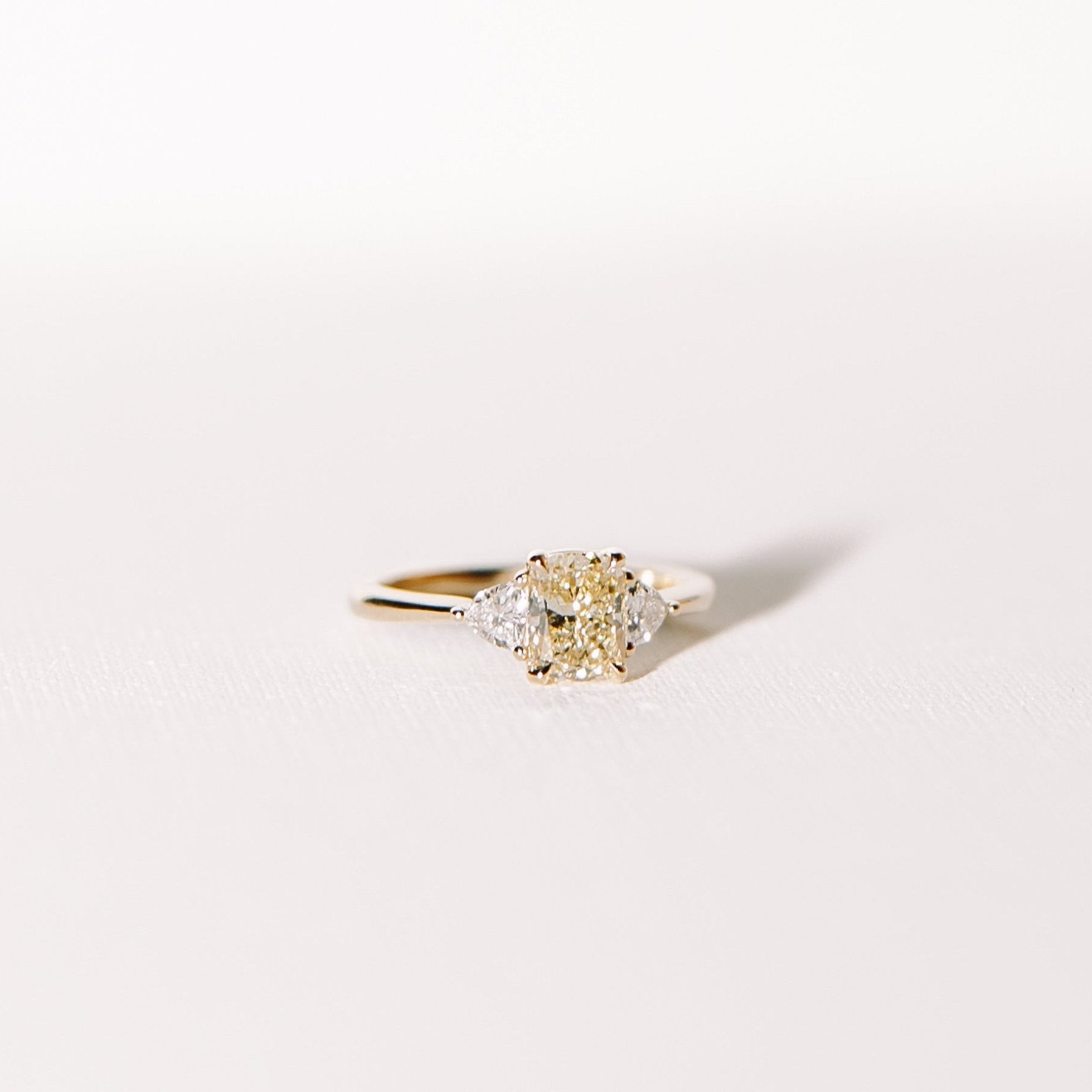 Yellow Cushion Cut Diamond Three Stone Ring