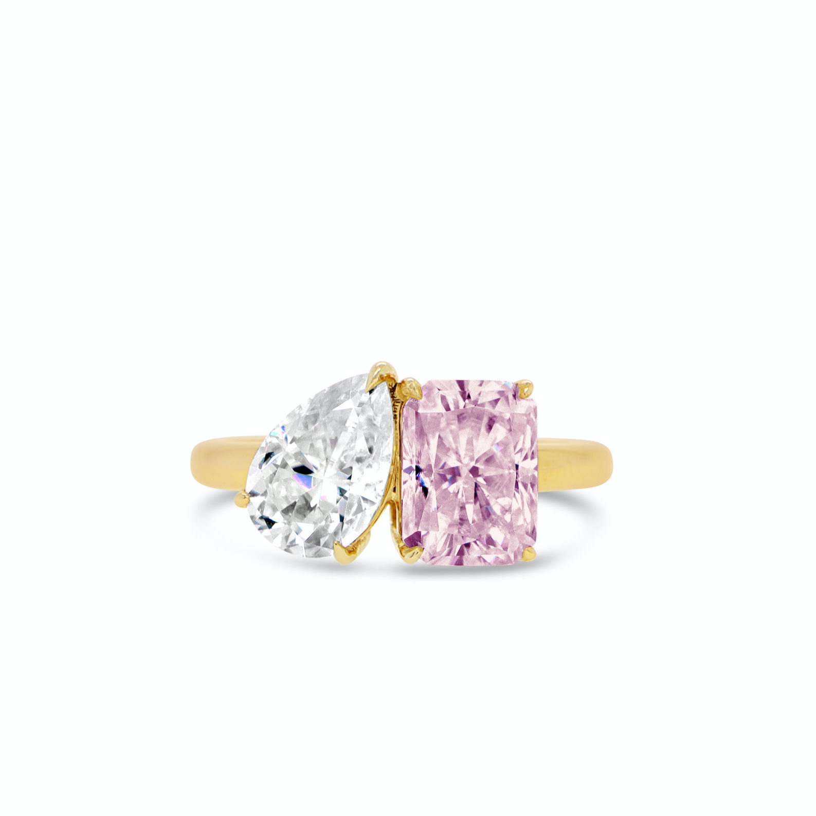toi et moi engagement ring with pear shaped lab diamond and radiant cut pink sapphire in yellow gold
