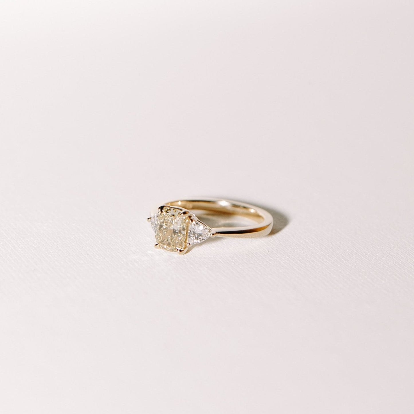 Yellow Cushion Cut Diamond Three Stone Ring