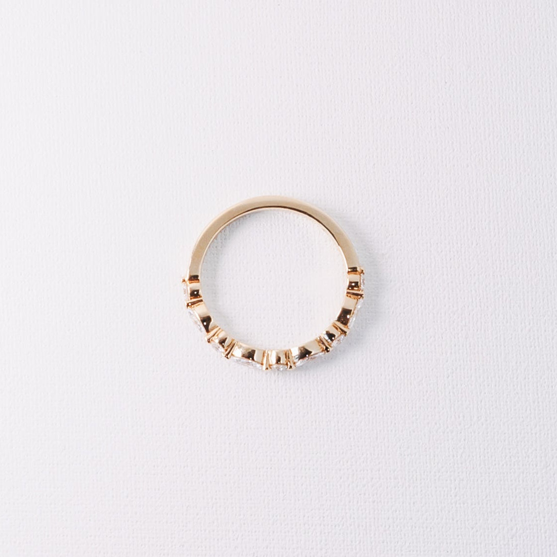 Marquise and round lab diamond half eternity wedding band in 14k yellow gold top view showing band design