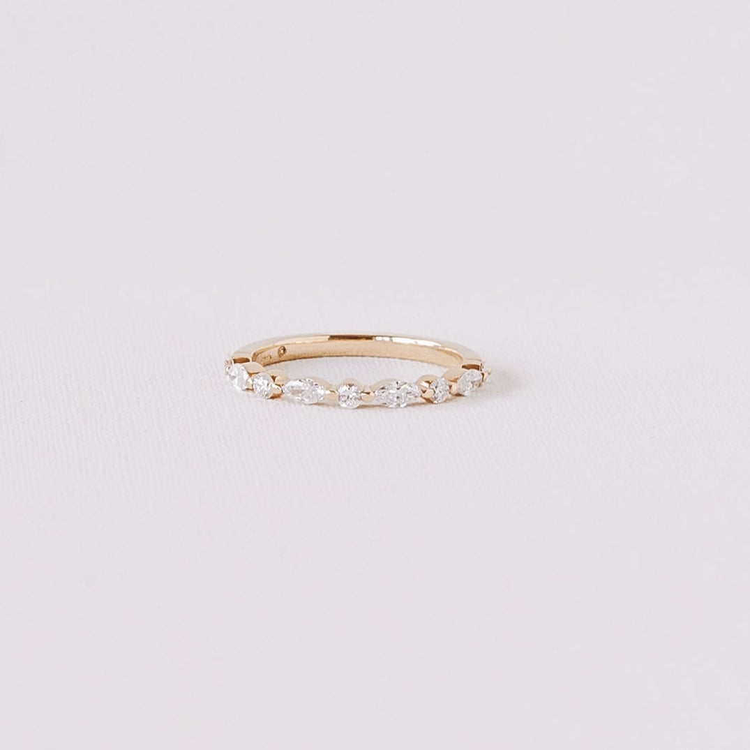 Marquise and round lab diamond half eternity wedding band in 14k yellow gold centered product view on white background