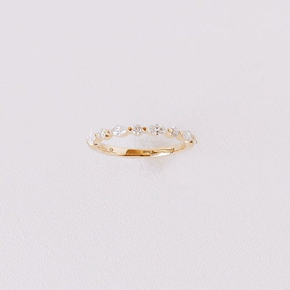 Marquise and round lab diamond half eternity wedding band in 14k yellow gold front view on white background