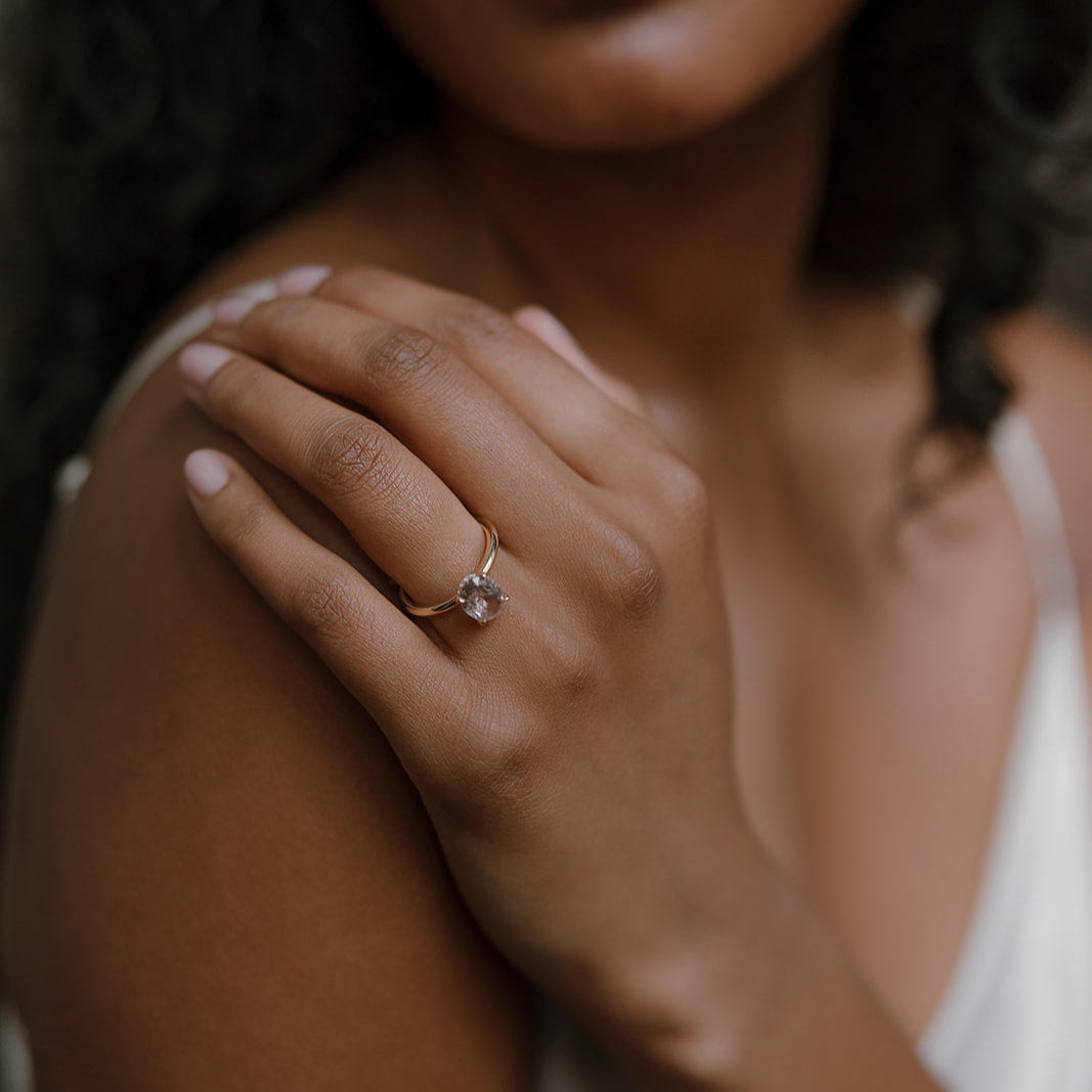 light pink sapphire with hidden halo of diamonds