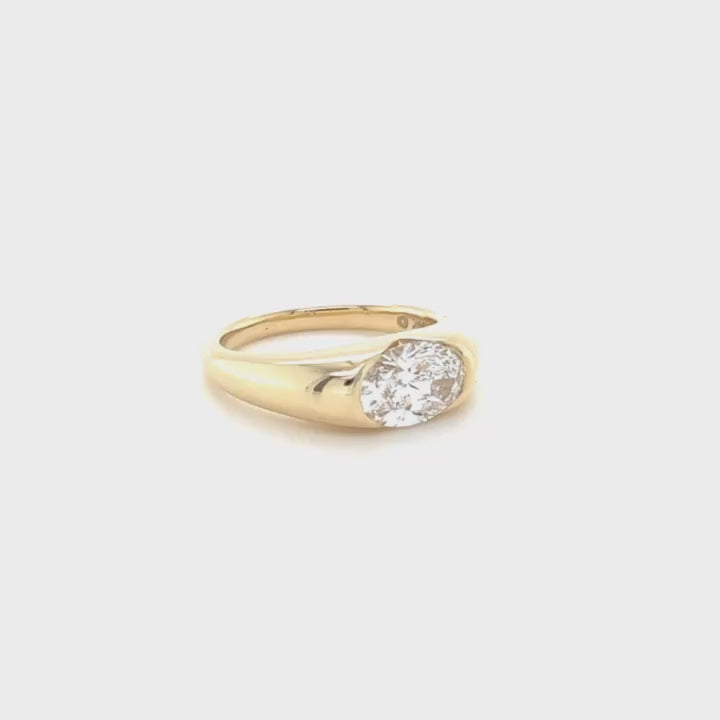 Diamond bezel ring on a white background rotating video 